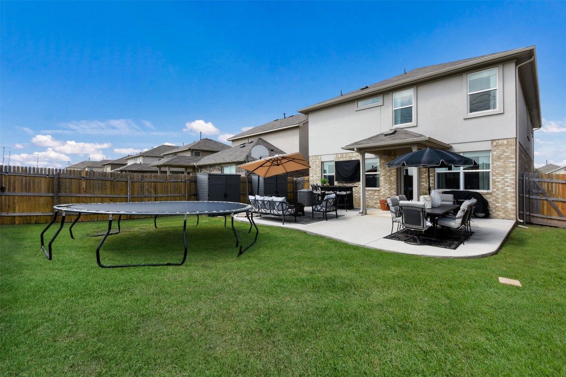 217 Frederick Drive Georgetown, TX 78626 - Photo 29 of 36 a view of outdoor space yard deck patio and swimming pool