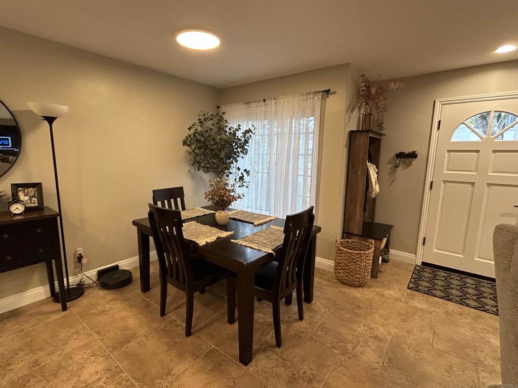 3546 Voyager Circle Carmel Valley, CA 92130 - Photo 14 of 28 a view of a dining room with furniture and a window