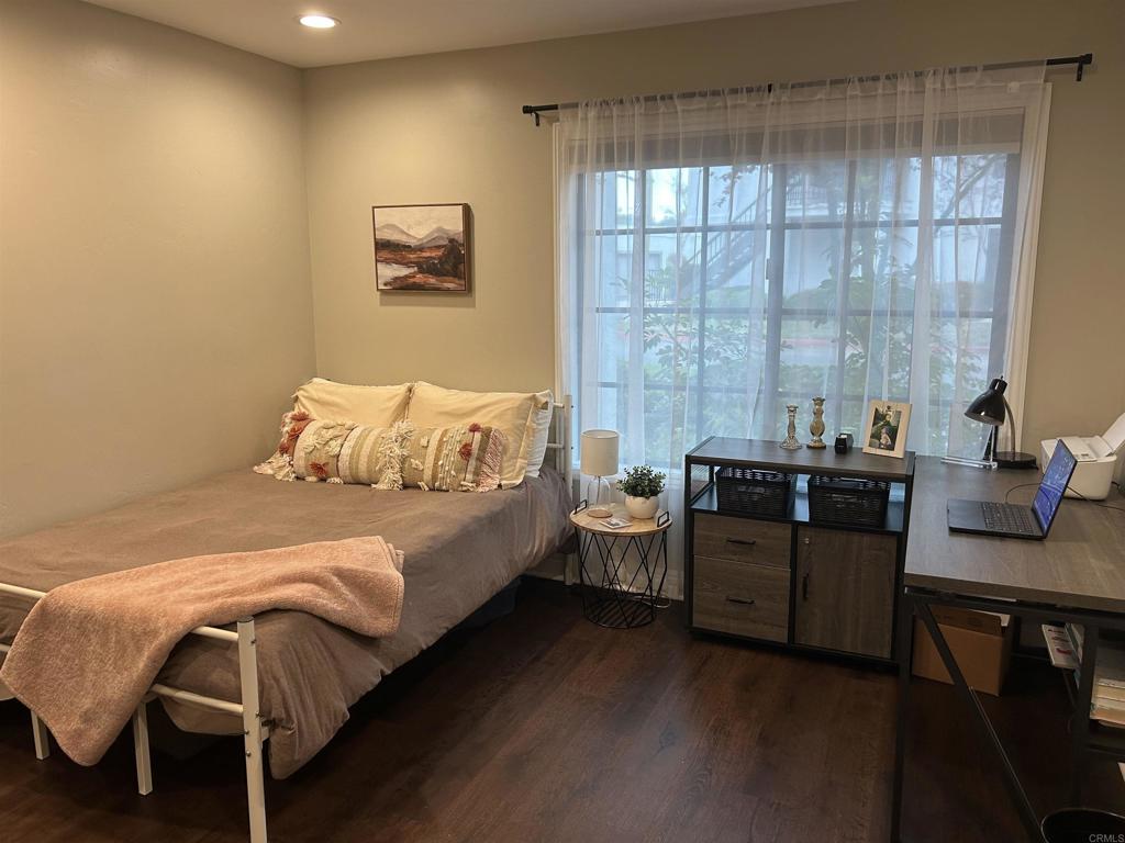 3546 Voyager Circle Carmel Valley, CA 92130 - Photo 17 of 28 a bed room with a bed and a chair