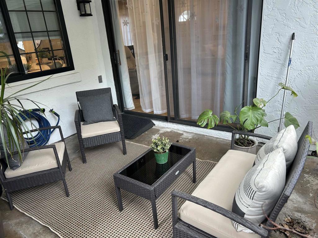3546 Voyager Circle Carmel Valley, CA 92130 - Photo 20 of 28 a living room with furniture and a potted plant