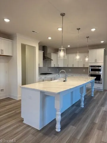 $587,415 | 318 Greenfield Drive, Gibsonville, NC 27249