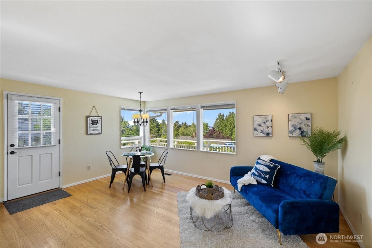 2606 49th Place Southwest Everett, WA 98203 - Photo 9 of 37 a living room with furniture and a large window