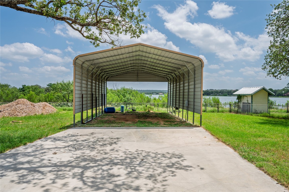 119 Lasso Loop Burnet, TX 78611 - Photo 22 of 35 a front view of a house with garden