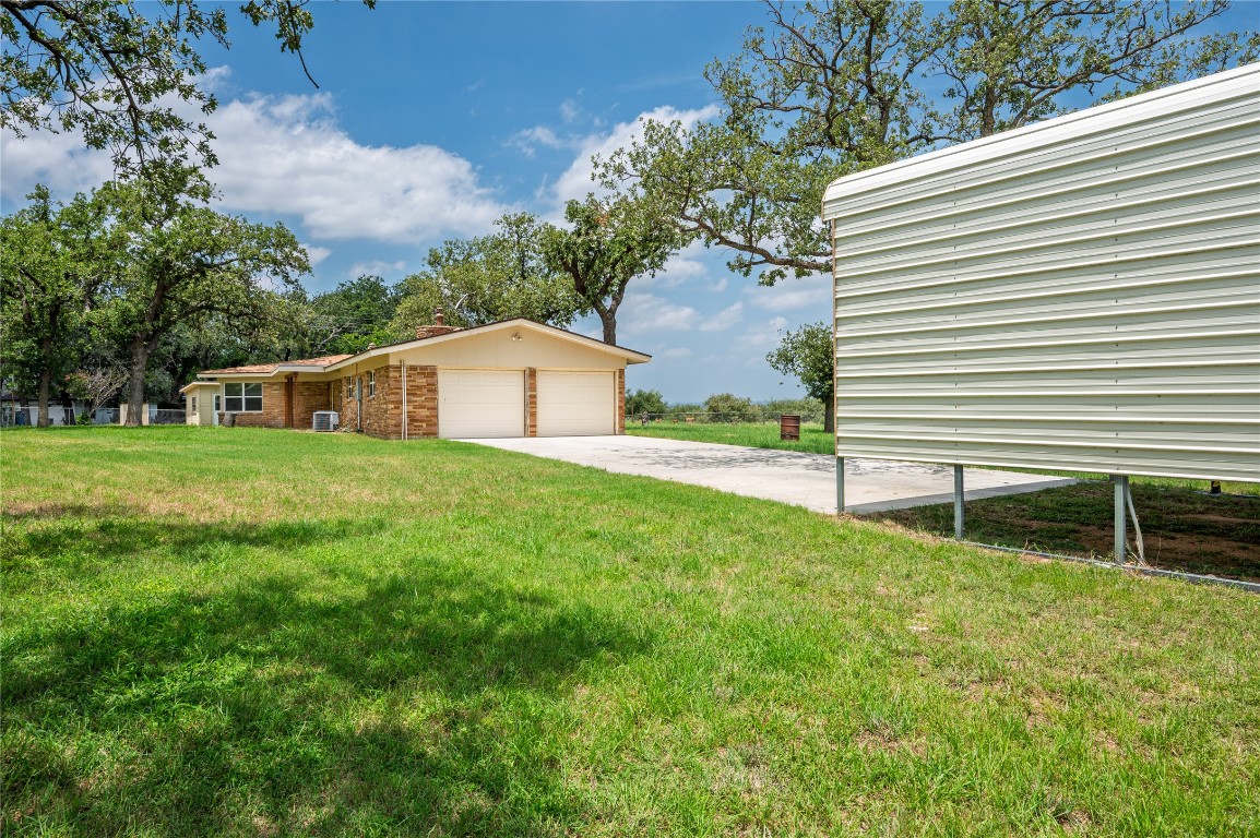 119 Lasso Loop Burnet, TX 78611 - Photo 27 of 35 a house view with a backyard space