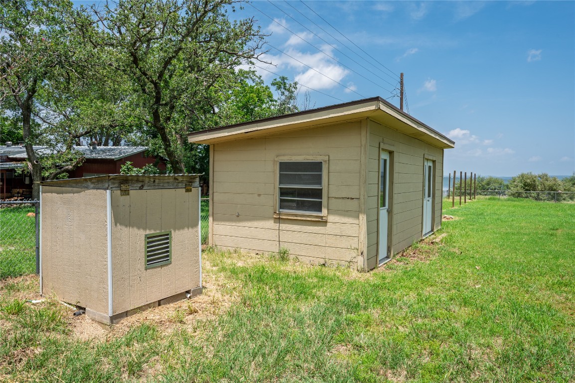 119 Lasso Loop Burnet, TX 78611 - Photo 35 of 35 a view of a house with a yard