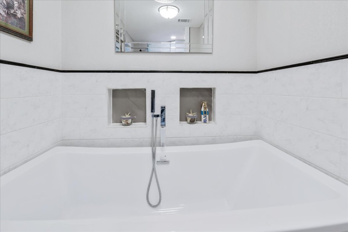 119 Lasso Loop Burnet, TX 78611 - Photo 4 of 35 a bathroom with a shower