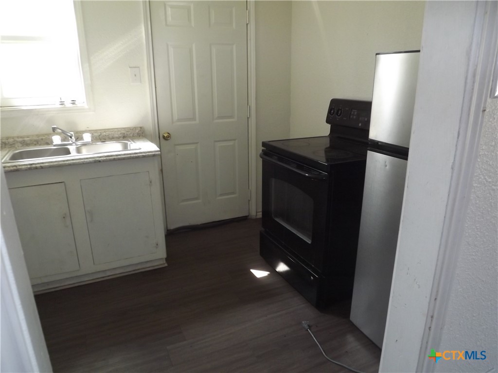 1714 Duncan Avenue Killeen, TX 76541 - Photo 9 of 24 a room with storage and utility