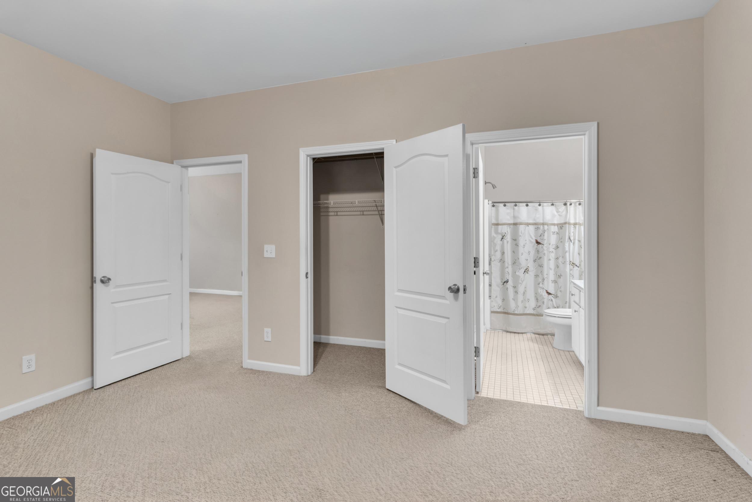 4557 Caleb Crossing, Unit 71 Powder Springs, GA 30127 - Photo 12 of 29 wooden floor and closet in a room