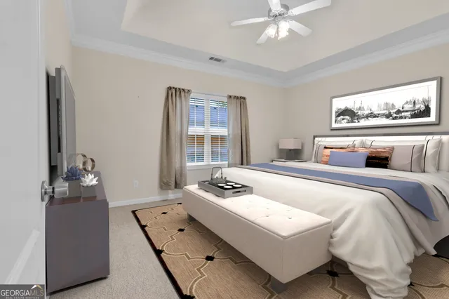 a bedroom with a bed and dresser with mirror