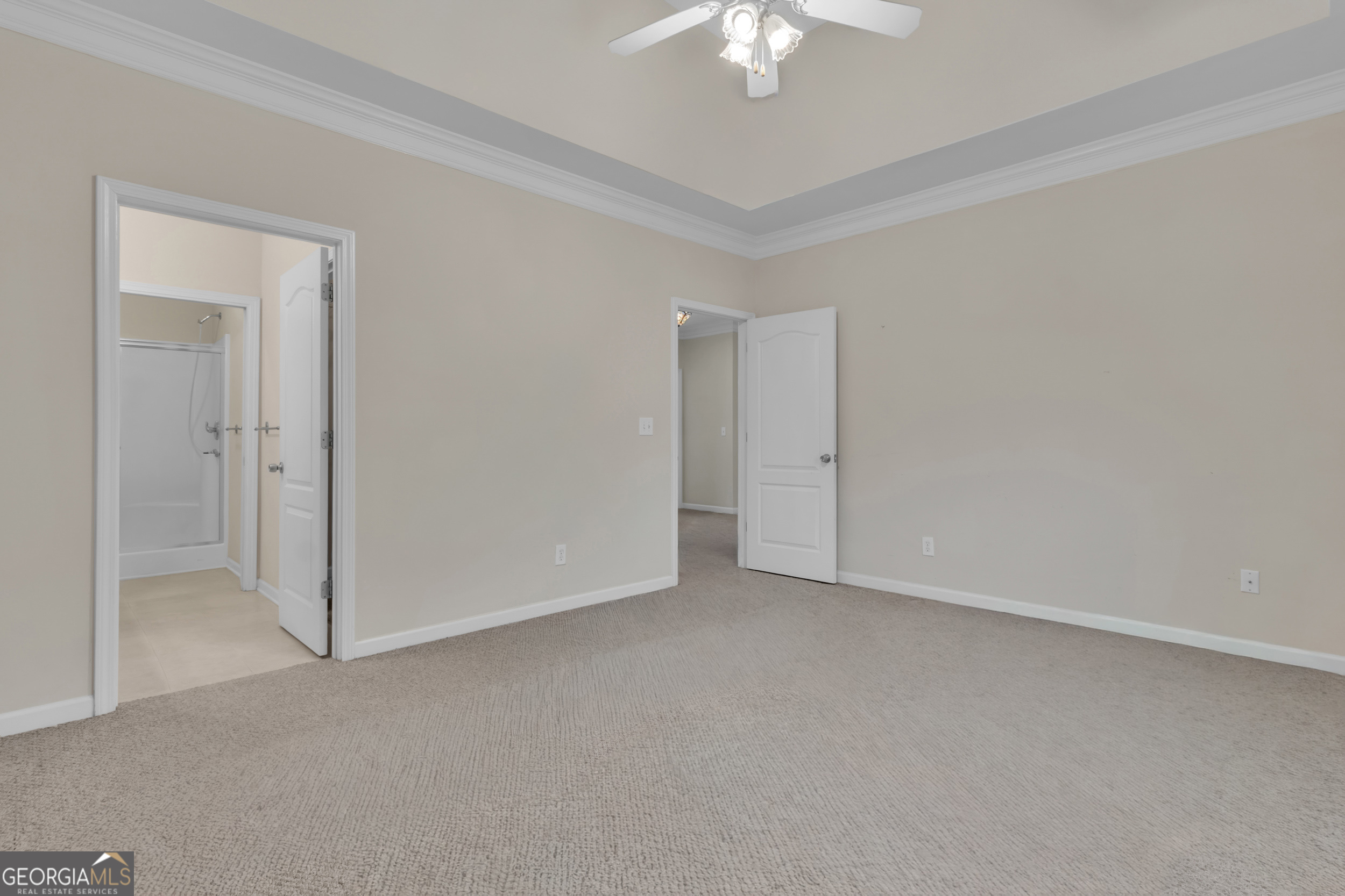 4557 Caleb Crossing, Unit 71 Powder Springs, GA 30127 - Photo 17 of 29 a view of an empty room with a chandelier fan