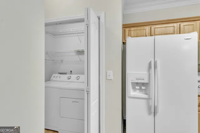 a bathroom with a shower a sink and a mirror