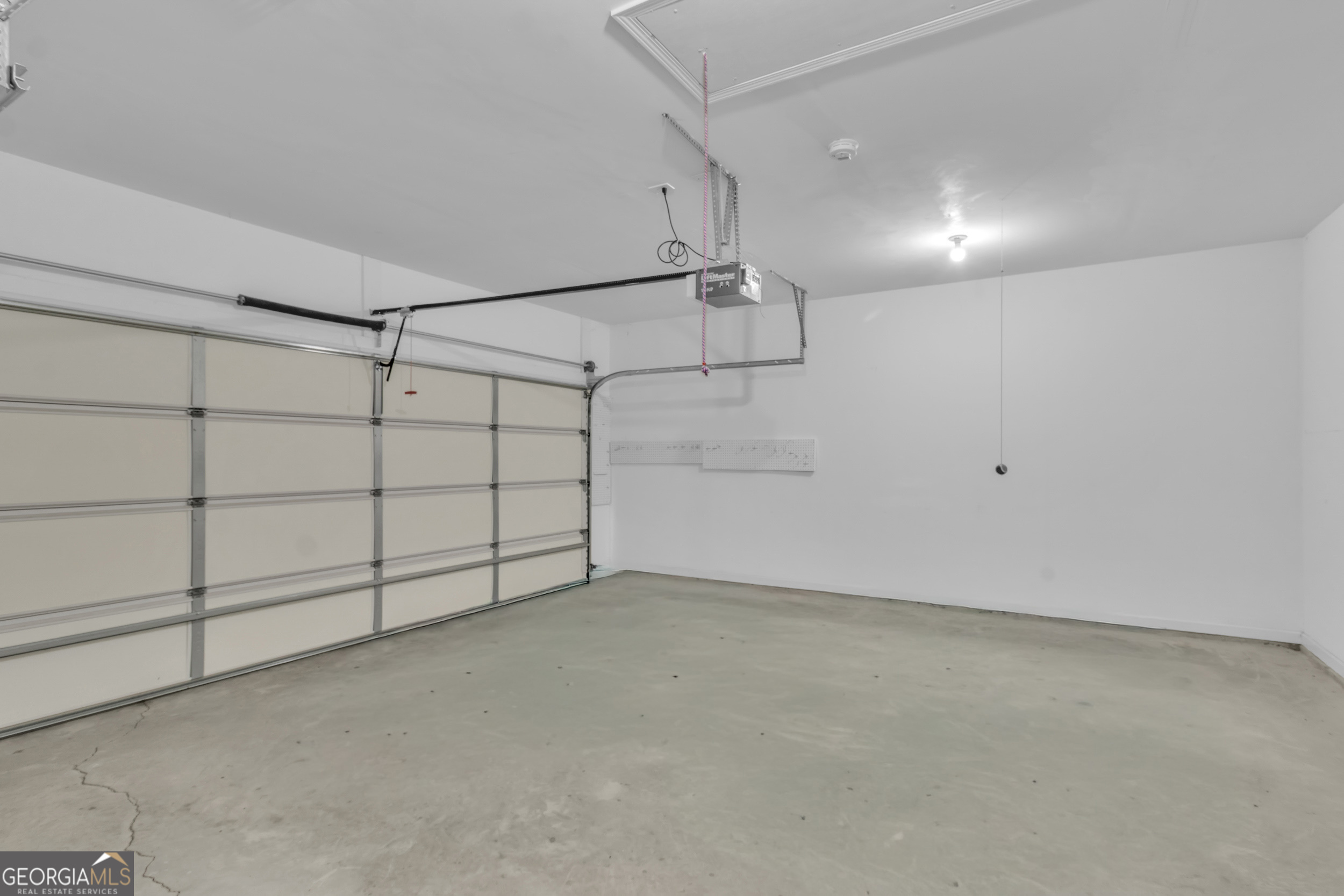 4557 Caleb Crossing, Unit 71 Powder Springs, GA 30127 - Photo 26 of 29 a view of a garage