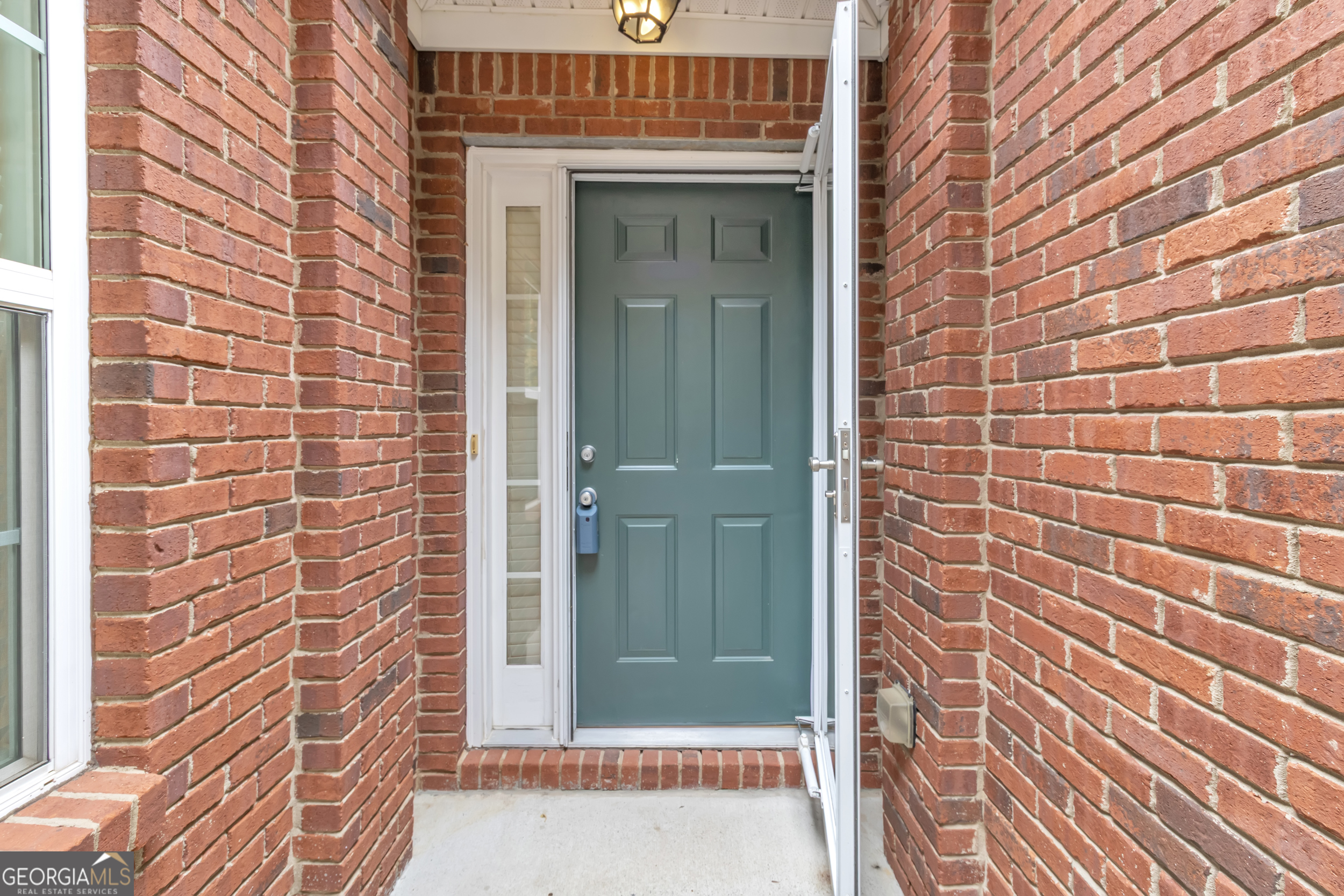 4557 Caleb Crossing, Unit 71 Powder Springs, GA 30127 - Photo 5 of 29 a view of a wooden door