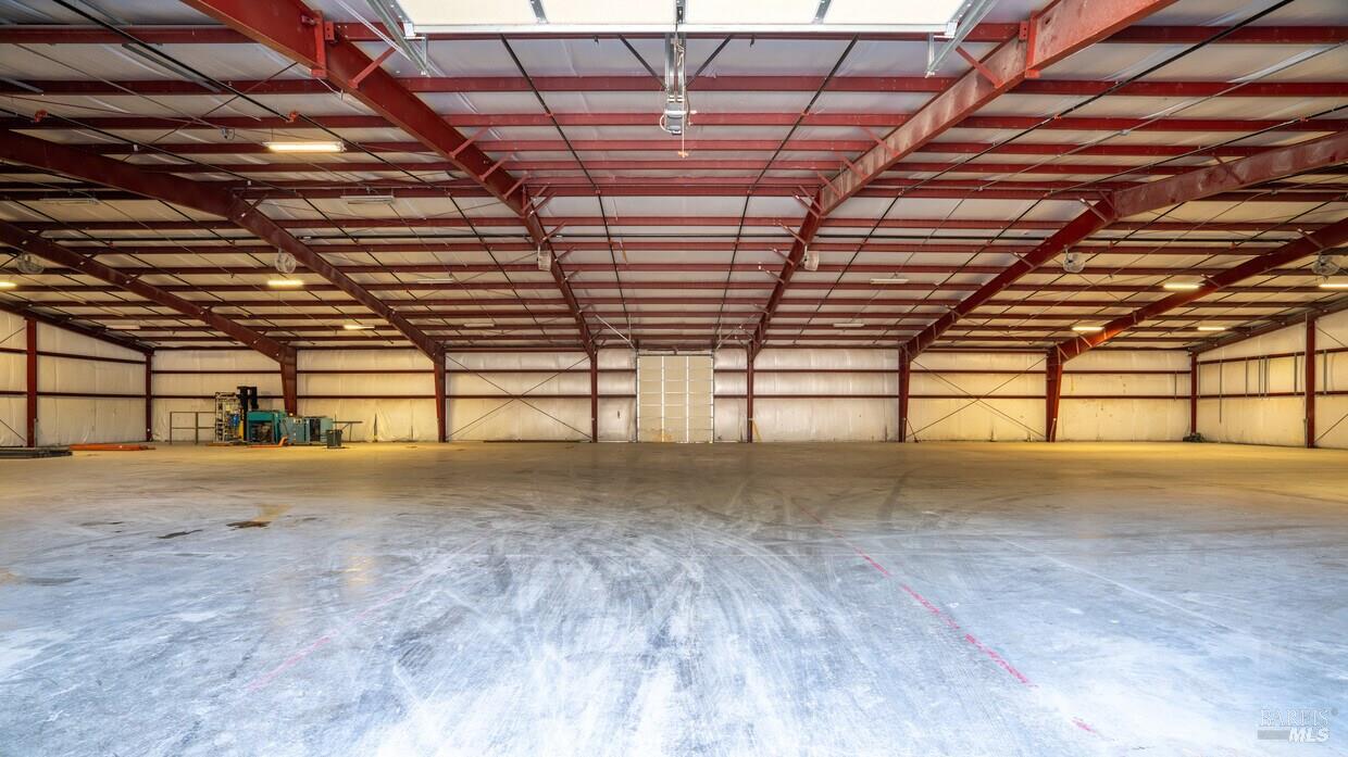 4770 Occidental Road Santa Rosa, CA 95401 - Photo 4 of 30 a view of empty room with wooden floor