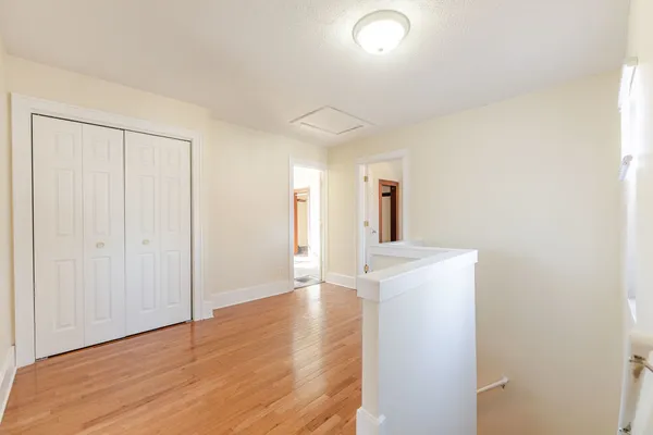 a view of a livingroom with wooden floor