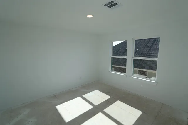 a kitchen with stainless steel appliances granite countertop a sink a stove and a wooden floors