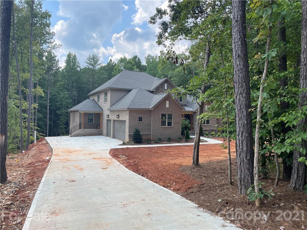 7112 Three Kings Road Fort Mill, SC 29715 - Photo 2 of 2 a house with trees in the background