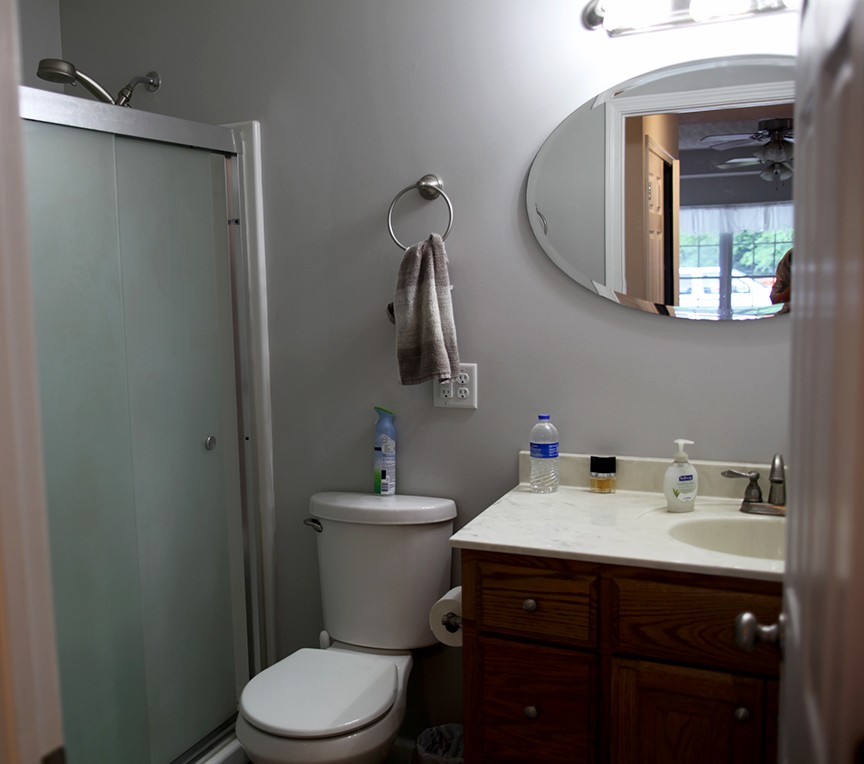 1047 Mooneyhan Road Springfield, TN 37172 - Photo 22 of 29 a bathroom with a sink toilet and mirror