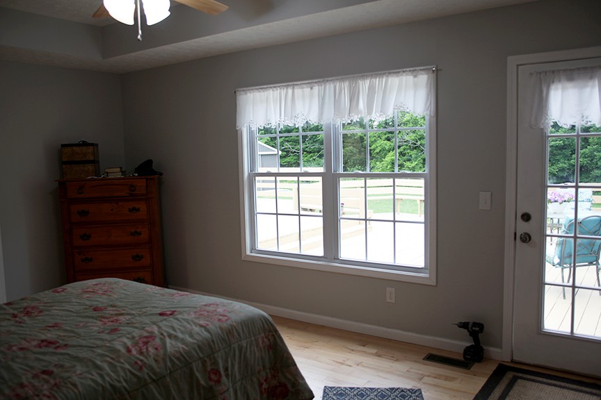 1047 Mooneyhan Road Springfield, TN 37172 - Photo 23 of 29 a bedroom with a bed dresser and a window