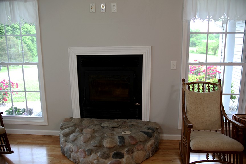 1047 Mooneyhan Road Springfield, TN 37172 - Photo 28 of 29 a bedroom with a bed window and a chair