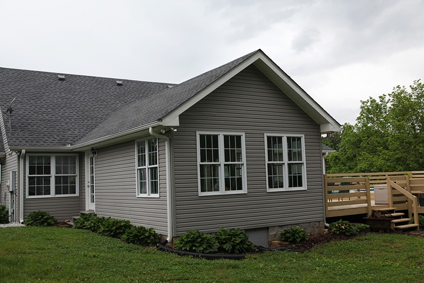 1047 Mooneyhan Road Springfield, TN 37172 - Photo 5 of 29 a front view of a house with a garden