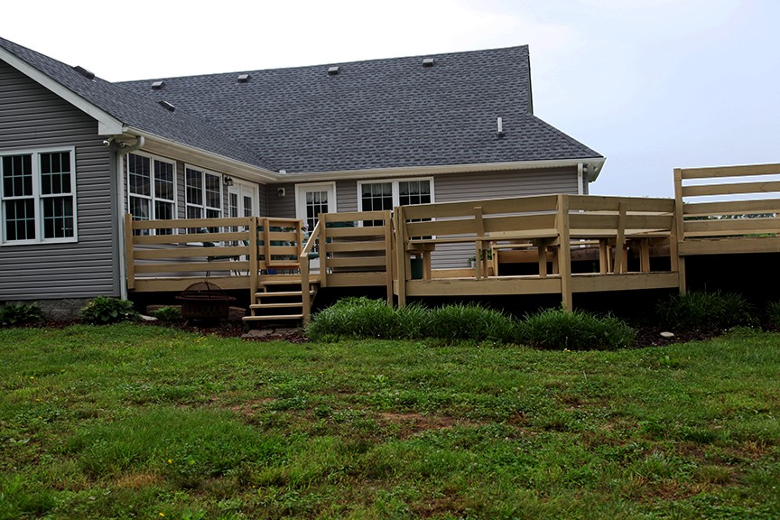 1047 Mooneyhan Road Springfield, TN 37172 - Photo 6 of 29 a front view of a house with a garden