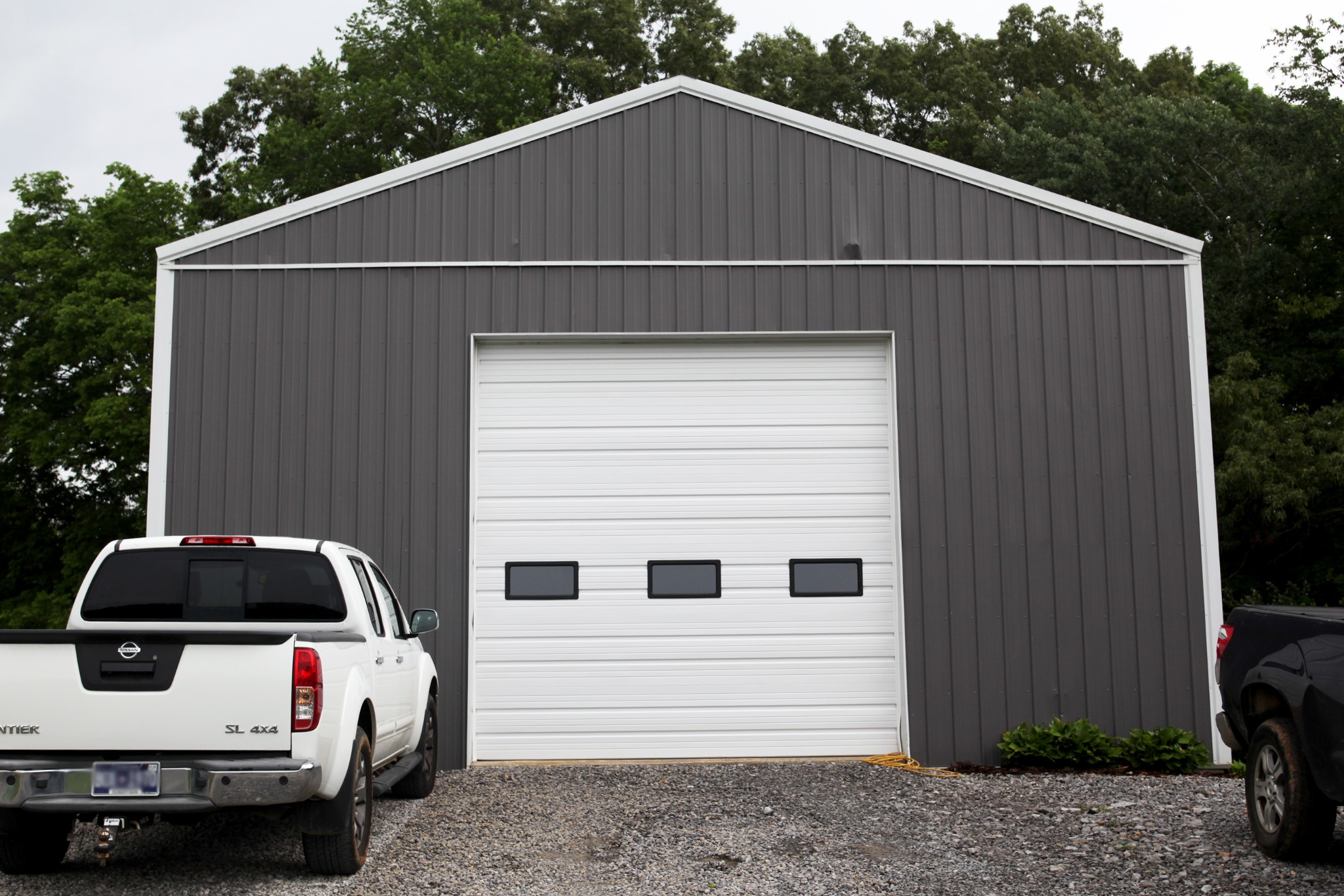 1047 Mooneyhan Road Springfield, TN 37172 - Photo 10 of 29 a car parked in front of white house