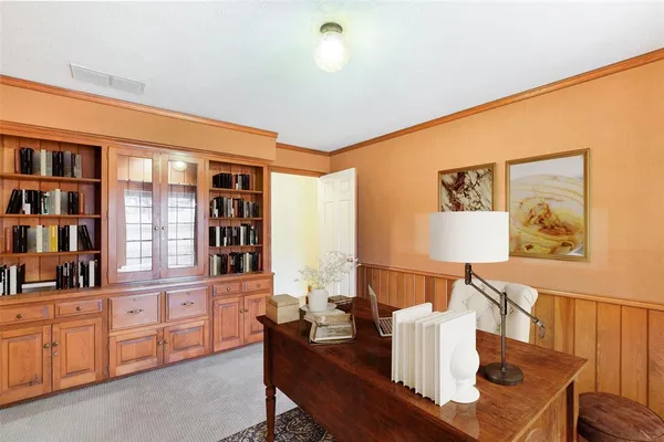 a living room with furniture and window