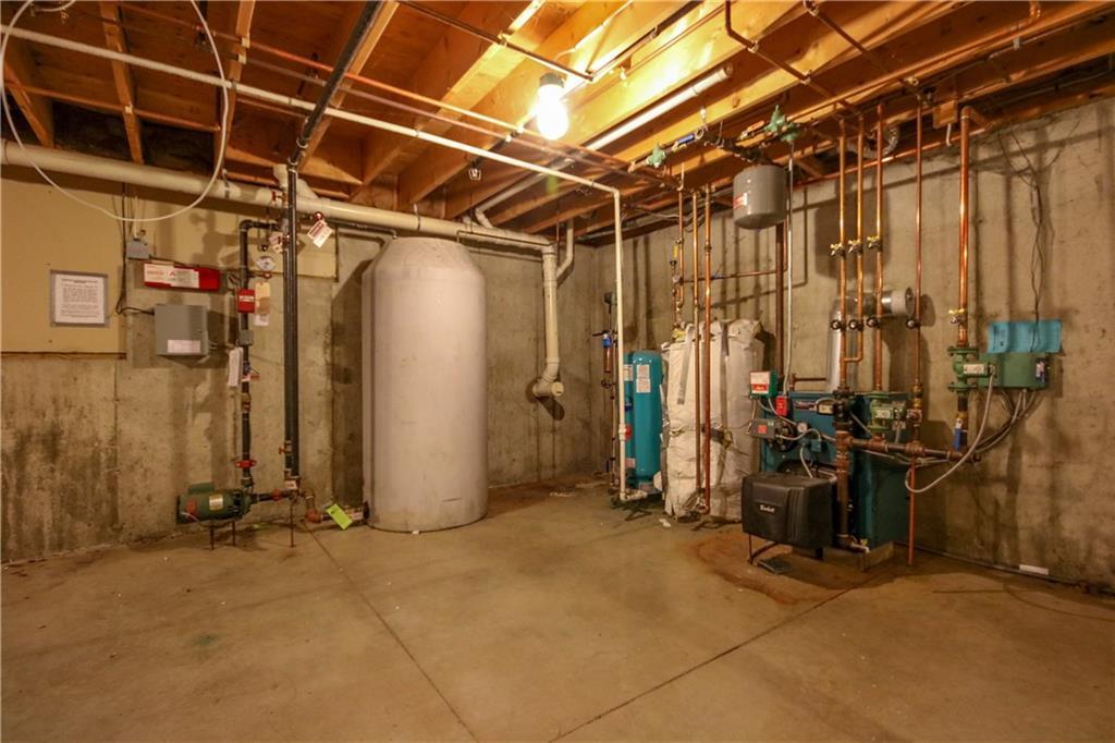 10 Samuel Road Raymond, ME 04071 - Photo 28 of 32 The large tank holds the water for...