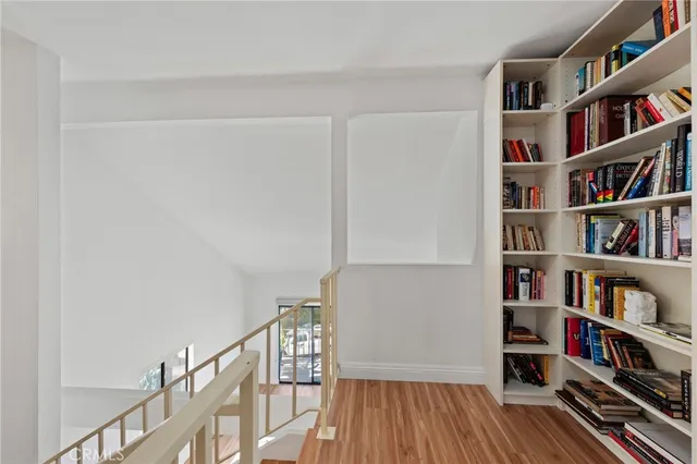 a view of room with toys and wooden floor
