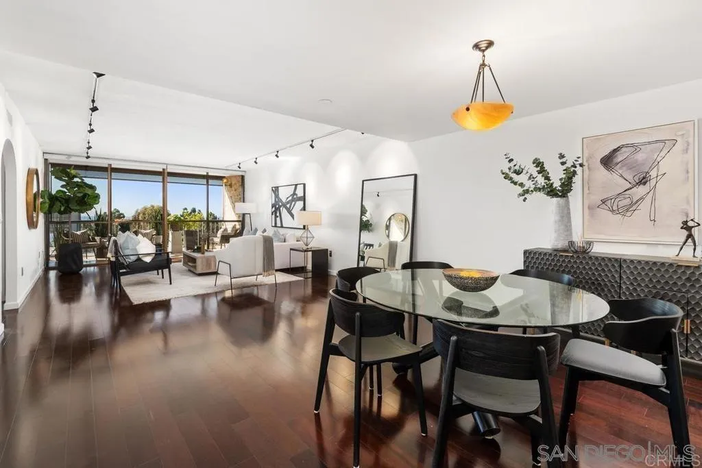 2500 Torrey Pines Road, Unit 402 La Jolla, CA 92037 - Photo 11 of 21 a view of a dining room with furniture and wooden floor