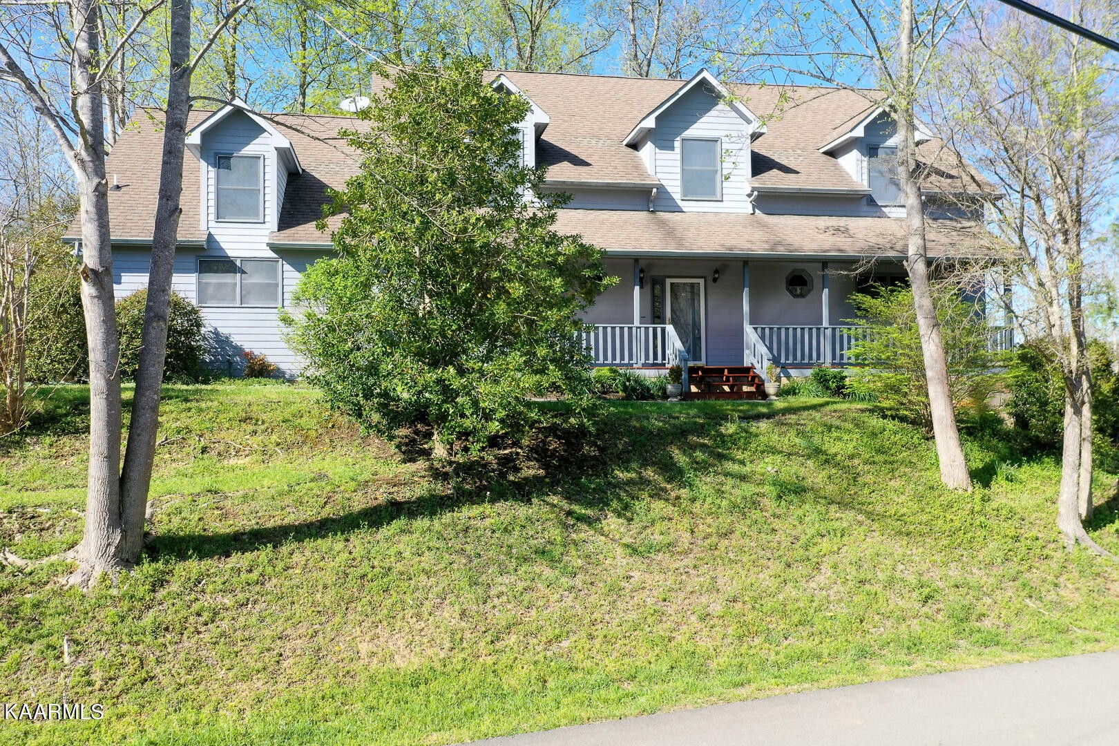 444 Laurel Road Townsend, TN 37882 - Photo 1 of 55 a front view of a house with a yard