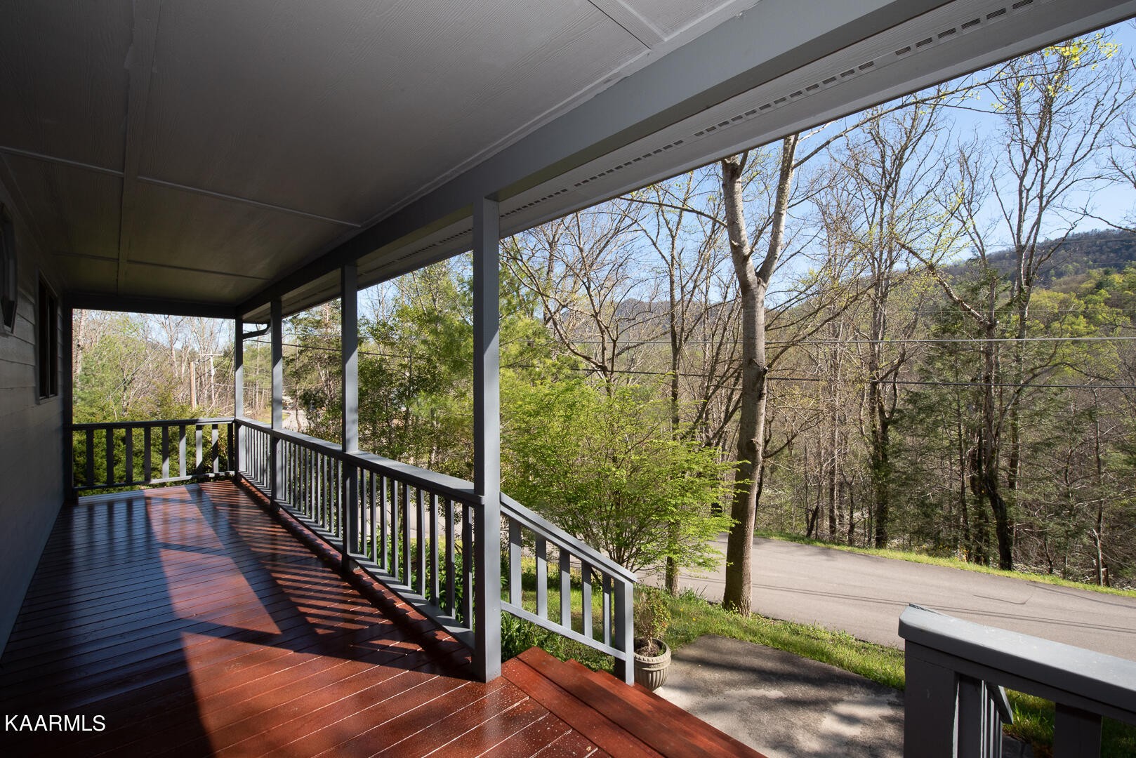 444 Laurel Road Townsend, TN 37882 - Photo 8 of 55 a view of a balcony with wooden floor