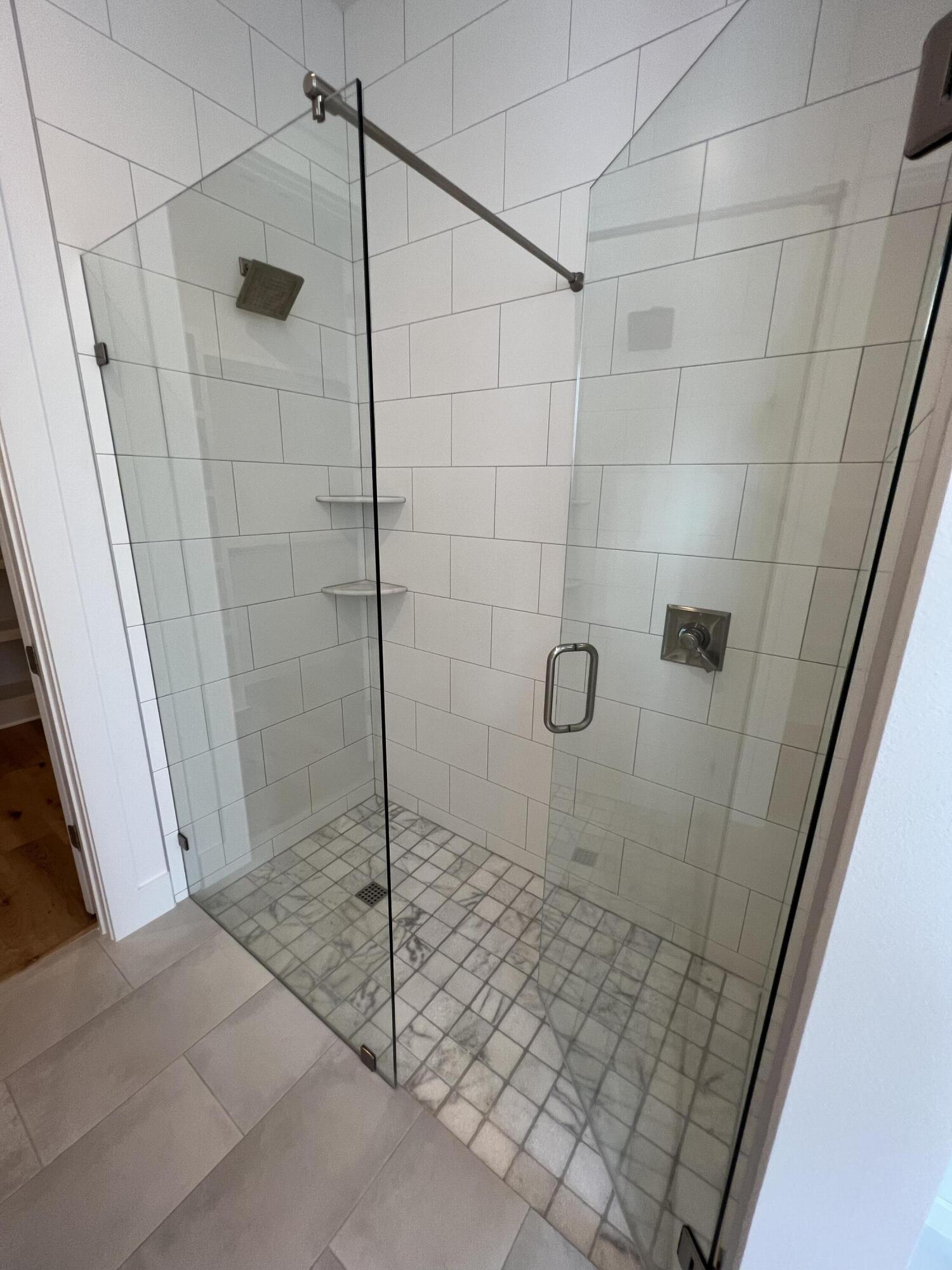 108 Sidecamp Road Watersound, FL 32461 - Photo 16 of 36 a bathroom with a shower