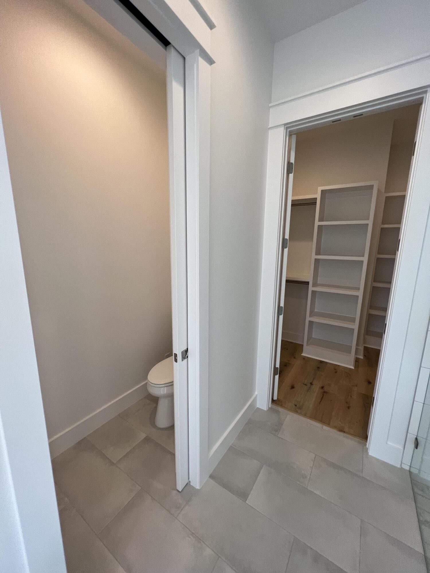 108 Sidecamp Road Watersound, FL 32461 - Photo 17 of 36 a view of room with a hallway