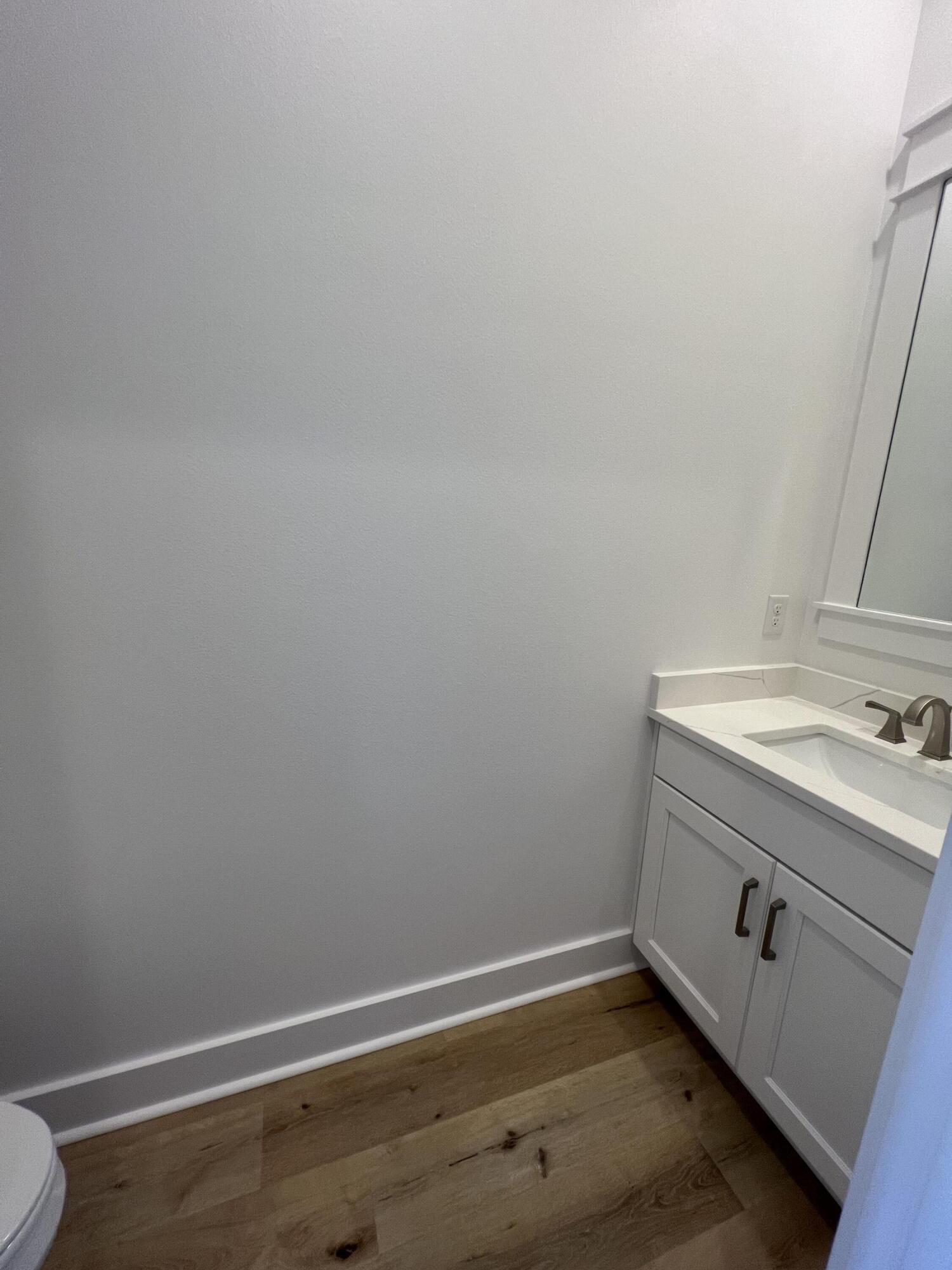 108 Sidecamp Road Watersound, FL 32461 - Photo 25 of 36 a bathroom with a sink and a vanity