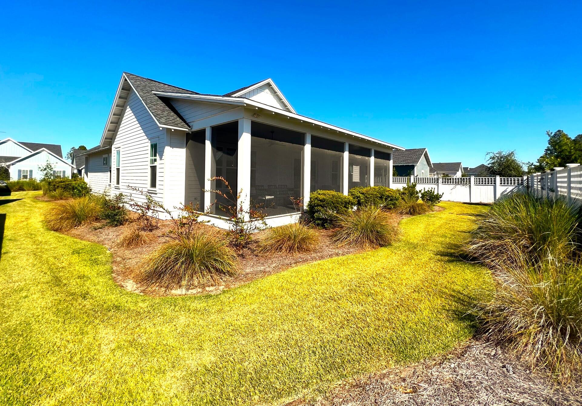 108 Sidecamp Road Watersound, FL 32461 - Photo 29 of 36 a view of a house with swimming pool
