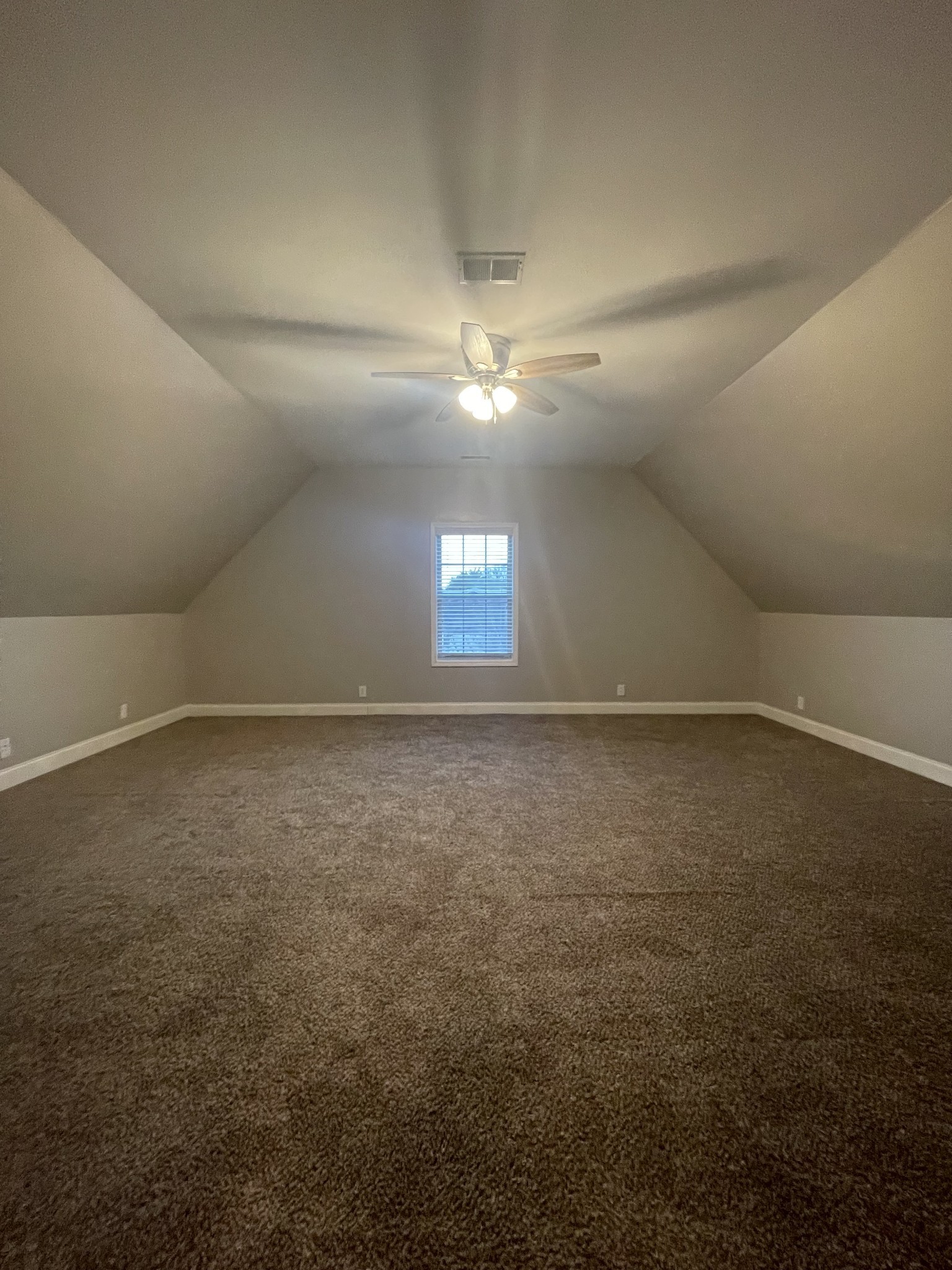 4815 Conquer Drive Murfreesboro, TN 37128 - Photo 10 of 10 en empty room with windows and fan
