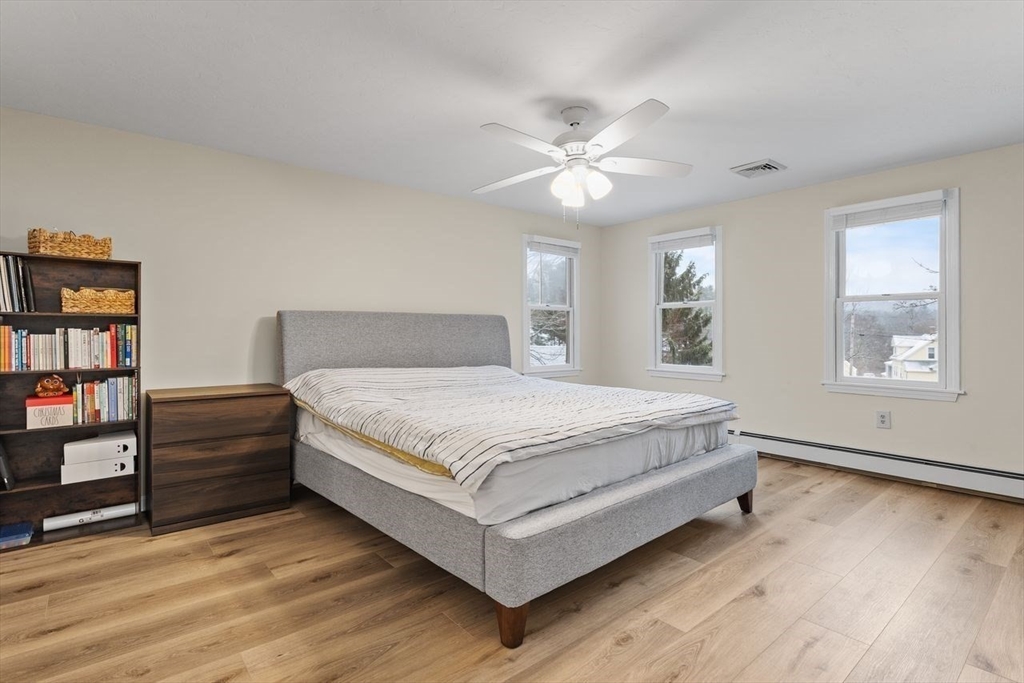 13 Plain Street Upton, MA 01568 - Photo 13 of 27 a bedroom with a bed and a window