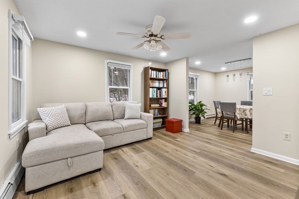 13 Plain Street Upton, MA 01568 - Photo 7 of 27 a living room with furniture and wooden floor