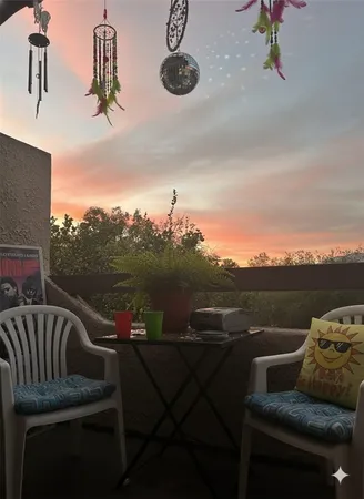 a view of a couches in a balcony