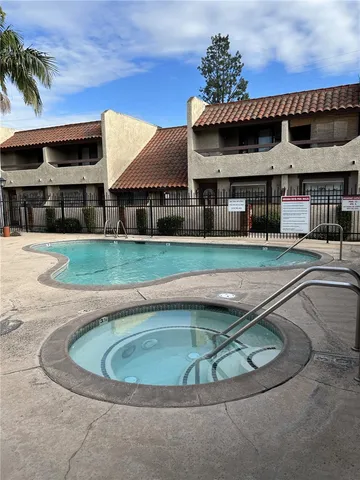 a view of a house with a swimming pool