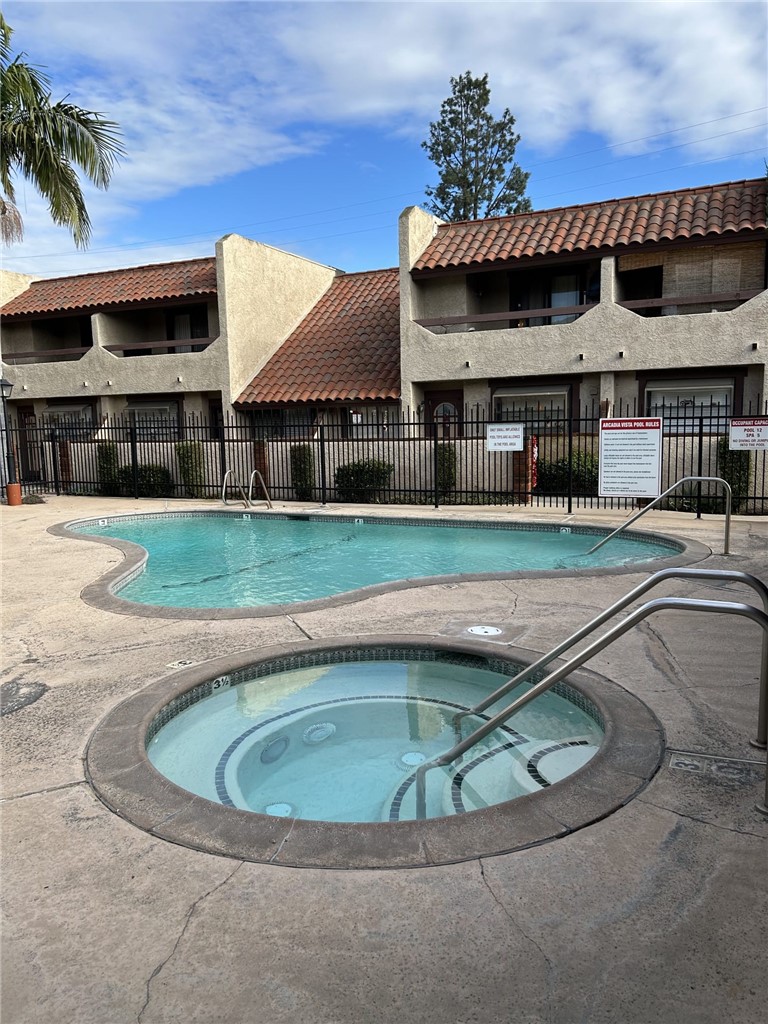5345 Peck Road, Unit B El Monte, CA 91732 - Photo 15 of 17 a view of a house with a swimming pool
