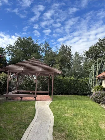 a view of a backyard with green space