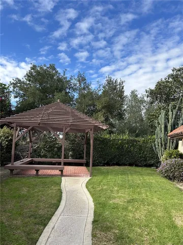 a view of a backyard with green space