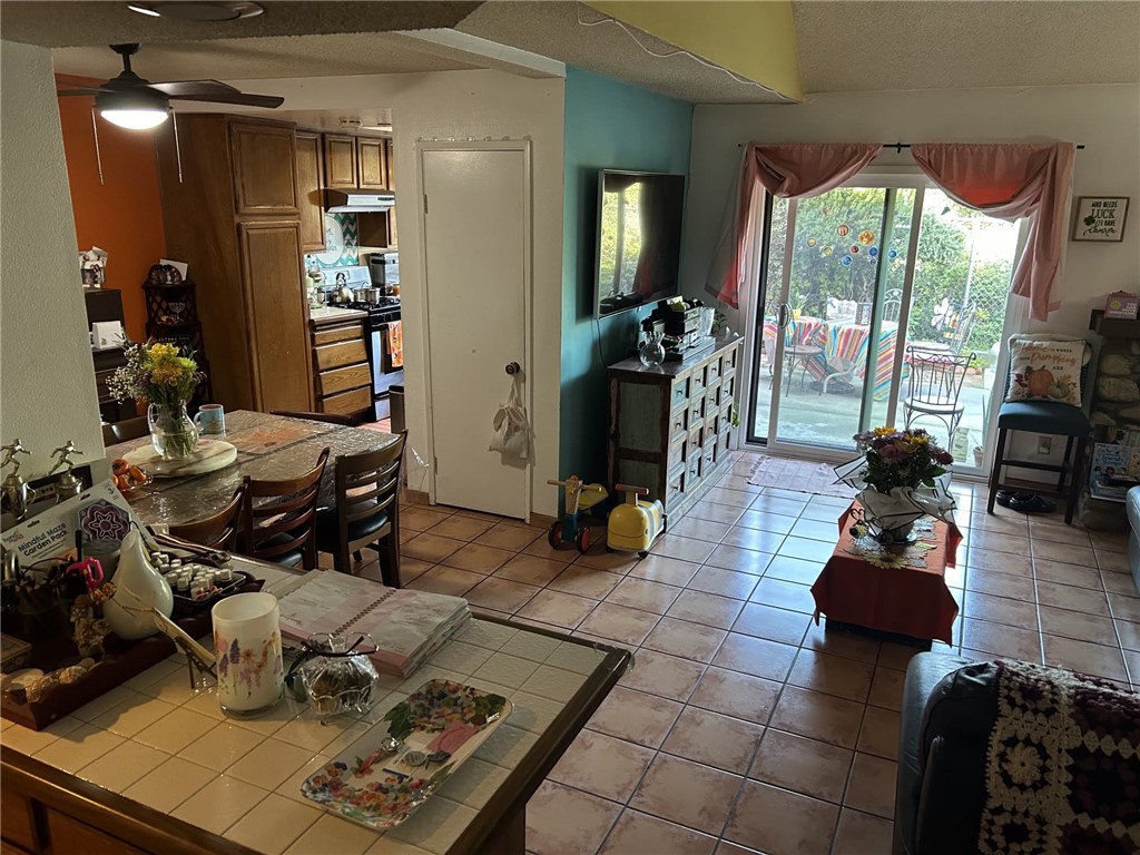 5345 Peck Road, Unit B El Monte, CA 91732 - Photo 10 of 17 a living room with furniture and a large window