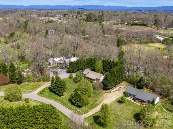an aerial view of residential house with outdoor space