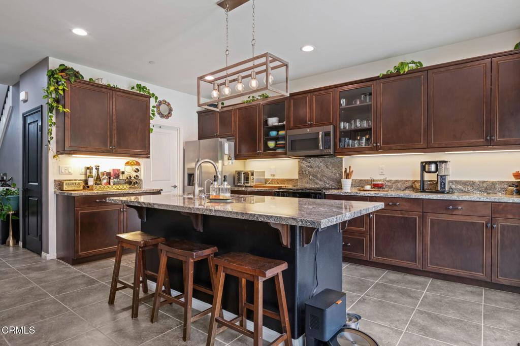 652 Xanadu Way Oxnard, CA 93036 - Photo 13 of 40 a kitchen with a sink cabinets and window