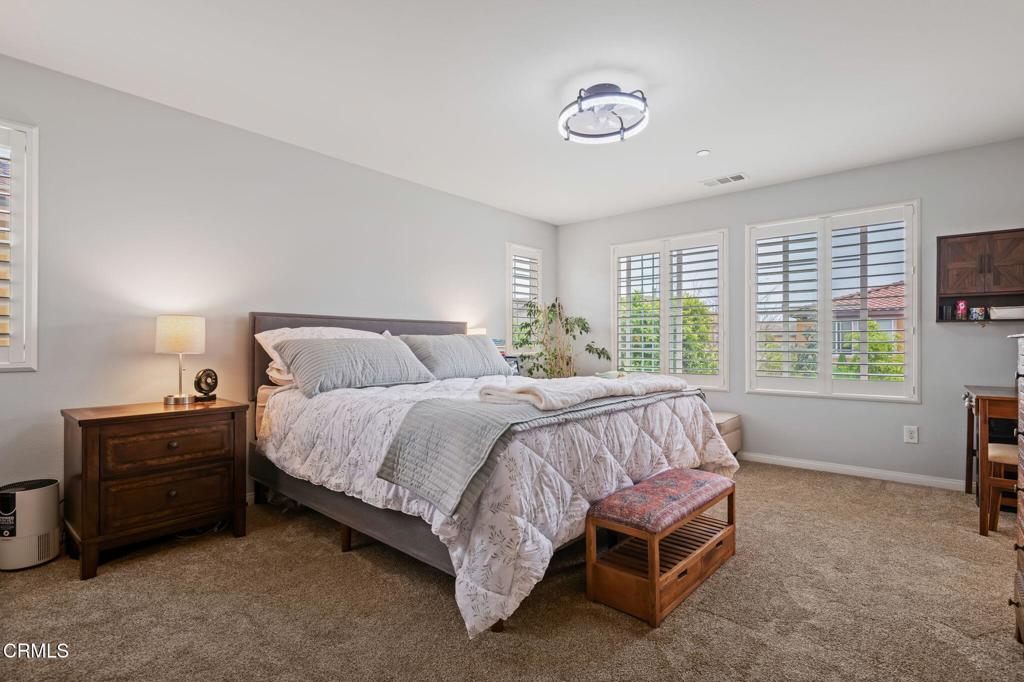 652 Xanadu Way Oxnard, CA 93036 - Photo 20 of 40 a bed sitting in a bedroom next to a window