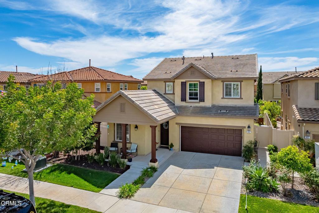 652 Xanadu Way Oxnard, CA 93036 - Photo 4 of 40 a front view of a house with garden